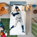 Bedding set with a baseball player design in a child's bedroom.