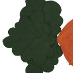 A large, orange, carrot-shaped bean bag with a green leaf on top, made of cotton fabric, kids bean bags and poufs singapore