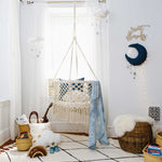 A beige and black geometric patterned washable rug with tassels on the border, kids rugs singapore