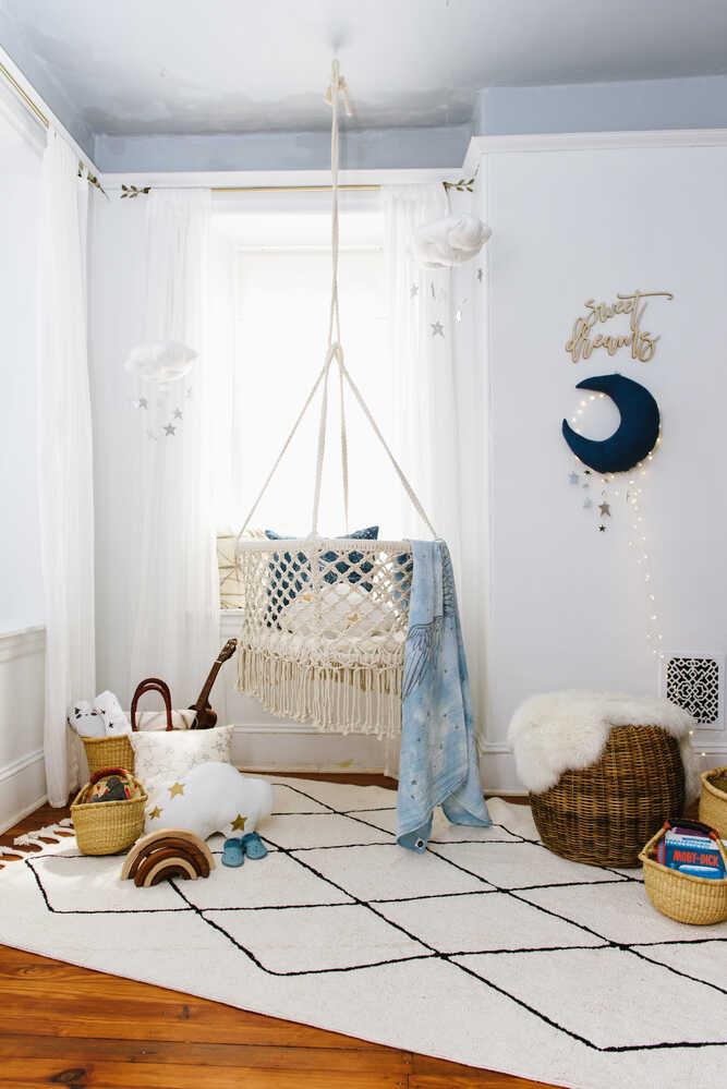 A beige and black geometric patterned washable rug with tassels on the border, kids rugs singapore