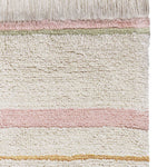 A rectangular, flatweave washable rug in beige, pink, and gray tones with a minimalistic geometric pattern, kids rugs and carpets singapore