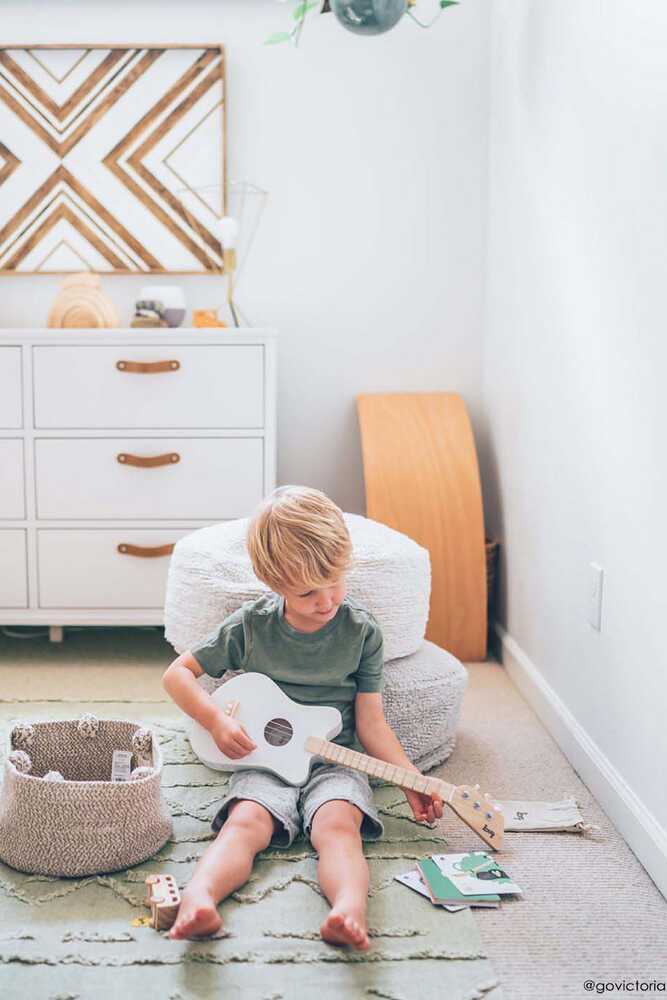 A round pearl grey pouf made of cotton, with a textured surface, kids bean bags and poufs Singapore