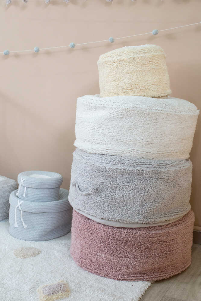 A round pearl grey pouf made of cotton, with a textured surface, kids bean bags and poufs Singapore