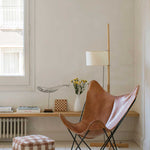 A square-shaped pouf with a brown and white checkered pattern, designed for children's rooms, kids bean bags and poufs Singapore