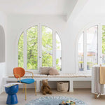 A round blue rug with the letters of the alphabet in white arranged around the edge. kids rugs singapore