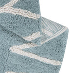 A round blue rug with the letters of the alphabet in white arranged around the edge. kids rugs singapore