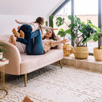 A rectangular, flatweave washable rug with a geometric pattern in a natural color. Kids Rugs Singapore