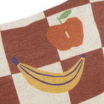 A rectangular linen cushion with a checkered pattern and fruit illustrations in maroon colour, available in Singapore