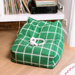 A green white windowpane patterned Nobodinoz Vibes armchair bean bag, kids bean bag and poufs Singapore