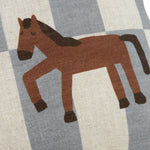 A rectangular linen cushion with a checkered blue and white pattern and a small horse illustration on the lower right side. Kids cushion, available in Singapore