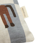 A rectangular linen cushion with a checkered blue and white pattern and a small horse illustration on the lower right side. Kids cushion, available in Singapore