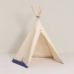 A blue and white Nobodinoz Vibes Tipi Arizona play tent made of organic cotton with wooden sticks, designed for children's indoor play, kids tipi tent, children tipi tent, available in Singapore