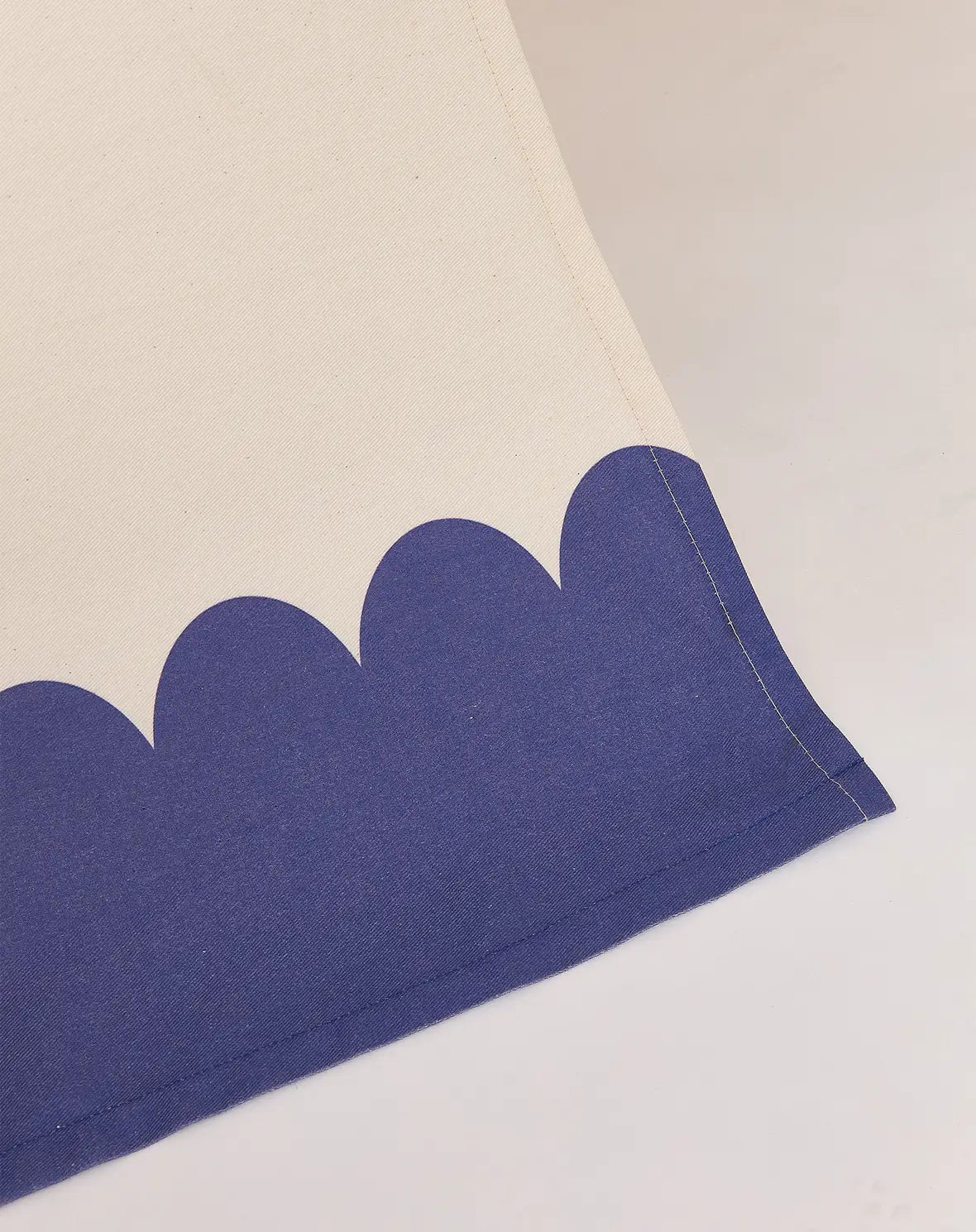 A blue and white Nobodinoz Vibes Tipi Arizona play tent made of organic cotton with wooden sticks, designed for children's indoor play, kids tipi tent, children tipi tent, available in Singapore