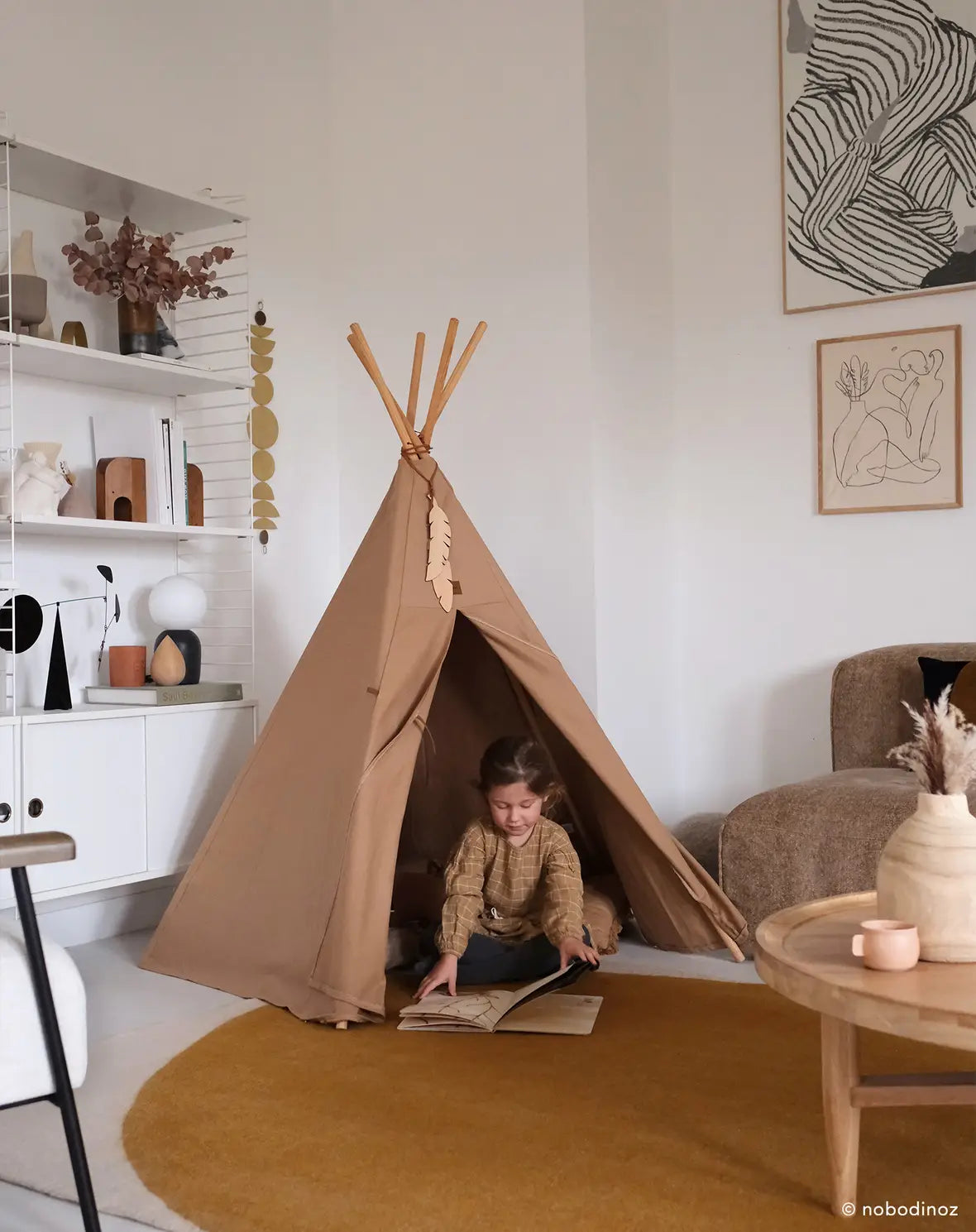 A beige Nobodinoz Tipi tent for kids in gender-neutral colour, kids tipi tent, children tipi tent, available in Singapore
