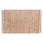 A hand-tufted pink rug with a textured design and fringed edges on the sides. kids rugs singapore