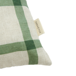 A rectangular linen kids cushion with a green windowpane pattern and a small bird illustration, available in Singapore