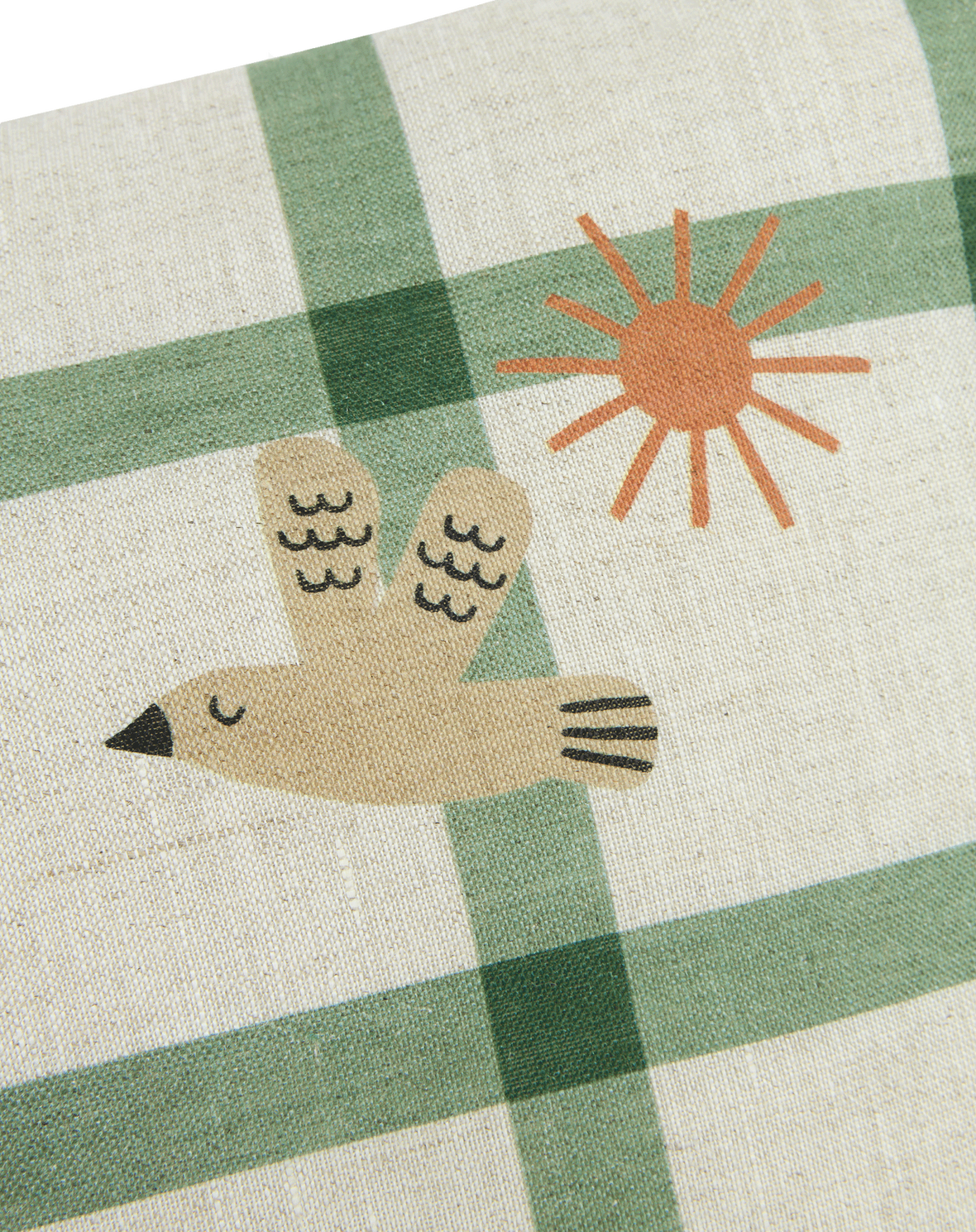 A rectangular linen kids cushion with a green windowpane pattern and a small bird illustration, available in Singapore