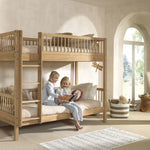 A two-story Forrest Oak Bunk Bed, convertible to 2 single beds, kids beds singapore, kids bunk bed singapore