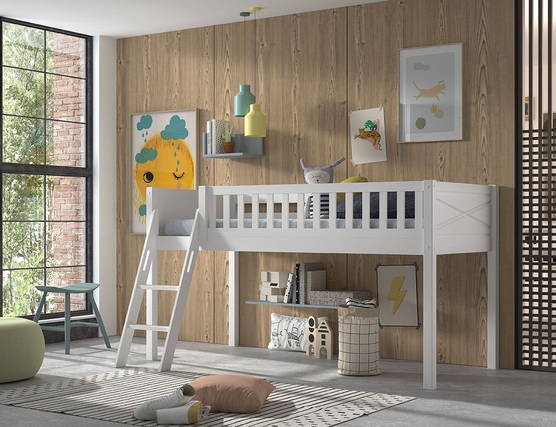A white loft bed made of solid Scandinavian pine wood with a ladder on the side. Available in Singapore