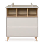 A white chest of drawers with a removable extension piece, designed for use as a changing table, quax loft chest clay