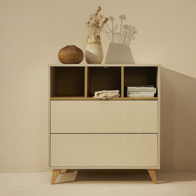 A white chest of drawers with a removable extension piece, designed for use as a changing table, quax loft chest clay