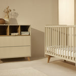 A white chest of drawers with a removable extension piece, designed for use as a changing table, quax loft chest clay