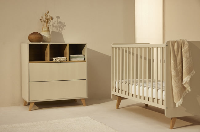 A white chest of drawers with a removable extension piece, designed for use as a changing table, quax loft chest clay