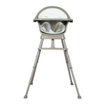 A Quax Ultimo High Chair in stone color with a modern design, featuring a high seat and adjustable legs, suitable for babies and toddlers.