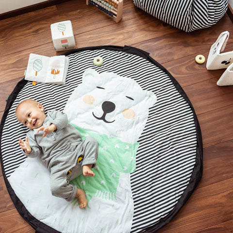Deer Industries Play & Go storage bag, play mat and diaper bag in one. New limited edition polar bear. Decluttering gets fun with Play and Go. 