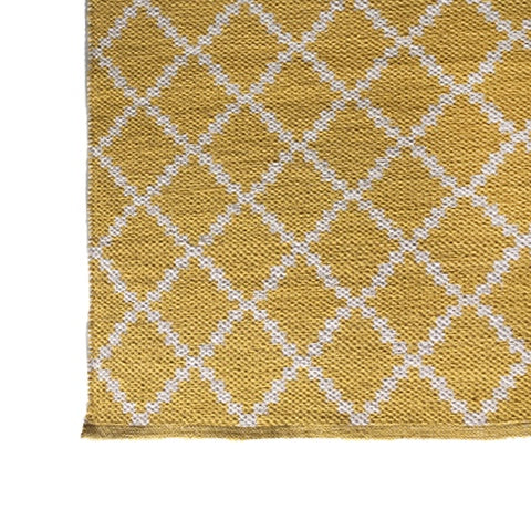 Deer Industries Deer Cotton Rugs Geometric design in warm yellow. Mustard yellow carpet to bright up any nursery, kids bedroom or living room. 